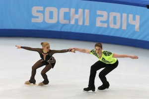Ukraine's Lavrentieva and Rudyk during team pairs' short program at the Sochi 2014 Winter Olympics