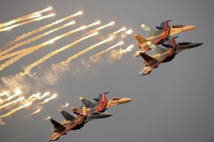 Russian Air Force Russkiye Vityazi team on their Sukhoi Su-27 jet fighters perform during a demonstration flight at the Moscow International Air Show (MAKS) in Zhukovsky