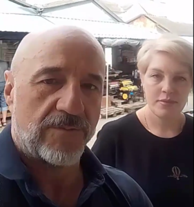 Колаборанти Дмитро Больбот і Ксенія Мусатова на ринку в Новій Каховці -